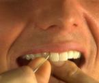 how to properly floss your teeth
